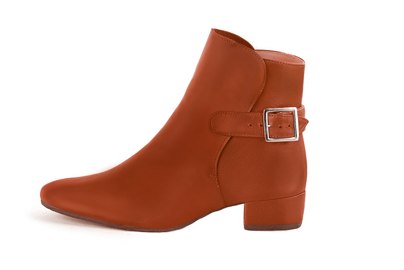 Terracotta orange women's ankle boots with buckles at the back. Round toe. Low block heels. Profile view - Florence KOOIJMAN